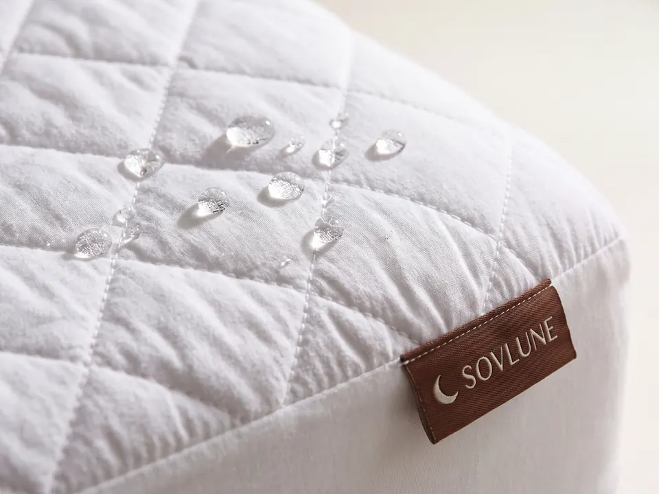 Close-up of the Guard Waterproof Mattress Protector fabric and Sovlune label